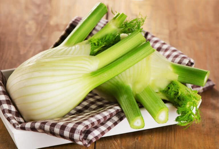 Fresh organic fennel in a wooden box.